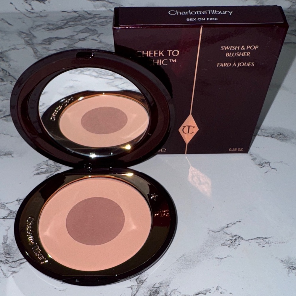 NWT Charlotte Tilbury blush: sex on fire
Never used 
Still in box
100% authentic
